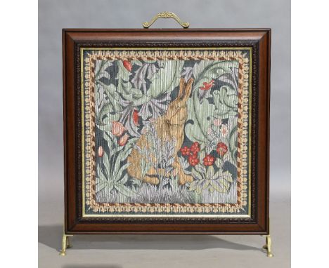 Property from the estate of the late David Cornwell, best-known as the author John Le CarréA mahogany fire screen, 20th centu