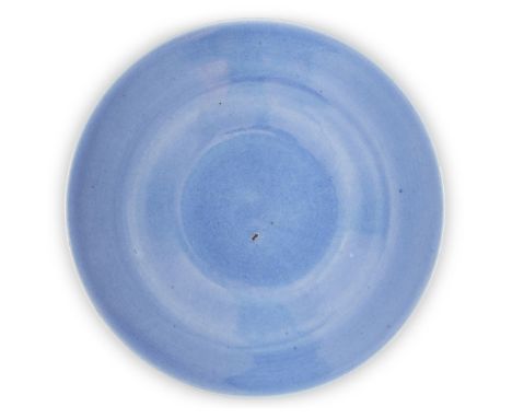 A Chinese monochrome blue-glazed dish, early 19th century, covered all-over in a pale blue glaze, 29cm diameter十九世紀早期 天藍釉碟Som