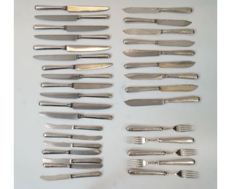 A group of silver flatware, comprising: four Victorian fish knives, London, 1863, probably Francis Higgins II, with filled si