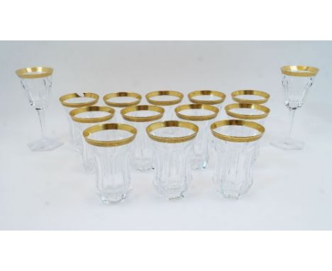 A collection of Moser cut crystal glasses, 20th century, etched factory mark to underside, each with gilded vine border to th