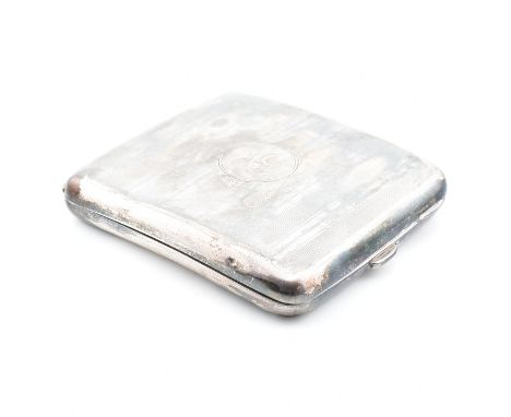 A George V hallmarked silver cigarette case. The case having an engine turned finish with central cartouche engraved 'JG' and
