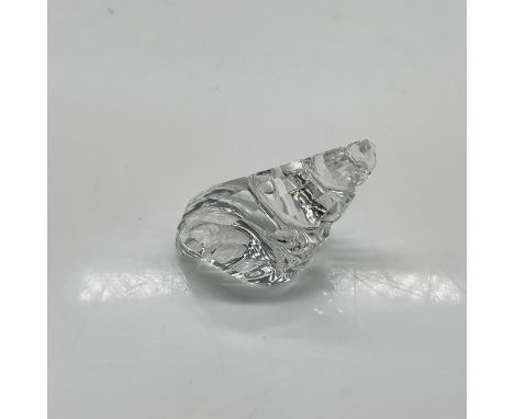 Part of the South Seas theme group, this clear crystal figural has spiral shell with coordinated facets. Swarovski backstamp.