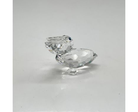 Clear faceted crystal figural with aqua crystal eyes. Swarovski backstamp. 7679 000 001. This item has its original box: 2.5"