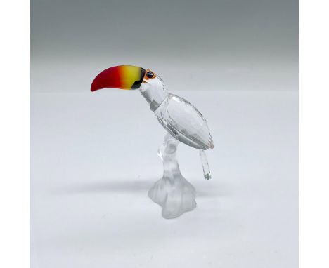 Part of the Feathered Beauties collection. A clear crystal facetted body of a tropical bird with a fire opal crystal beak, re