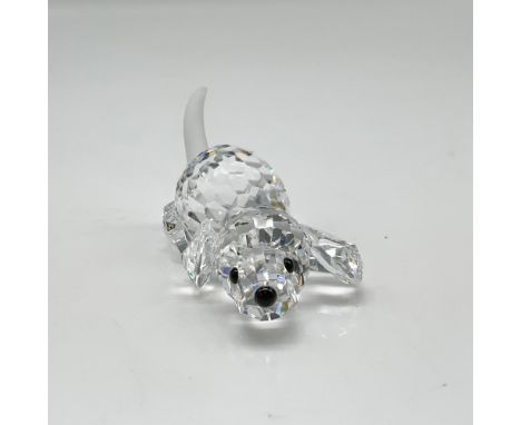 Cute, faceted dog has black crystal button eyes and nose with frosted crystal tail standing at attention. He is part of the P