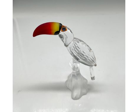 Part of the Feathered Beauties Collection figural sits on satin crystal branch looking out with his blue crystal eyes and poi