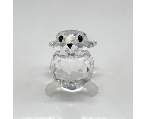 Faceted clear crystal head and body with black crystal eyes, nose and satin crystal tail and feet is a member of the In A Sum