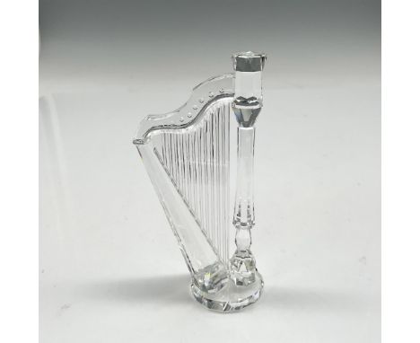 Part of the Crystal Melodies group, this lovely replicate in crystal of the delicate instrument is quite striking. Swarovski 