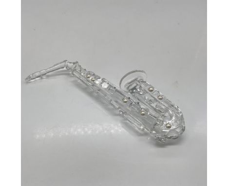 Part of the Crystal Melodies group made of clear crystal with pearl crystal accents. No stand. Swarovski backstamp. 7477 000 