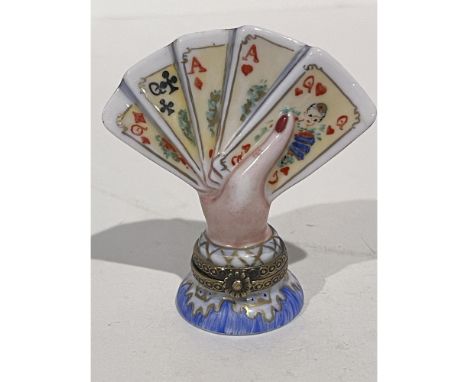Card players and casino goers will adore this very detailed hand painted ring clad hand holding a lucky full house poker hand
