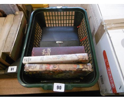 A cased playing card set and a quantity of books