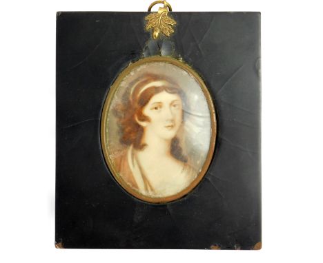 A head and shoulders portrait miniature of Lady Hamilton, with hand painted detail over a printed image, indistinctly signed,