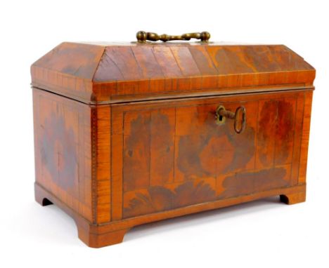 A George II laburnum and walnut cross banded tea caddy, of rectangular form, the domed lid with brass double scroll handle, r