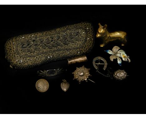 A selection of silver jewellery and effects, comprising a three silver brooches, a silver plated commemorative coronation pin