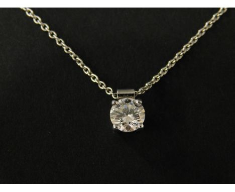An 18ct white gold diamond pendant, the diamond approx 0.44cts, in basket claw setting, with fold over scroll pendant top, in