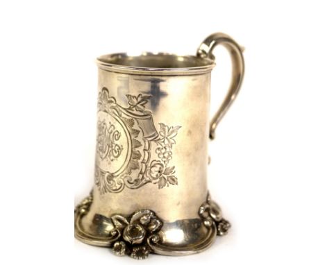 A Victorian silver christening mug, of tapered cylindrical design, with a double scroll handle and engraved with foliate and 