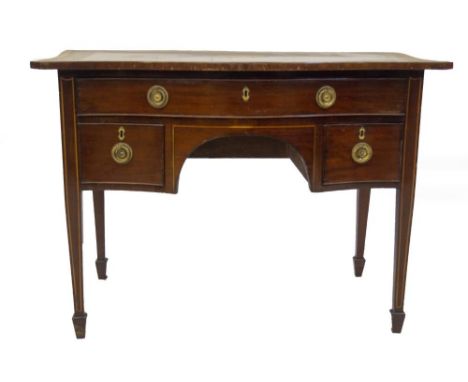 A George III mahogany serpentine lowboy, with ebony and boxwood stringing, satinwood banding, single frieze drawer with oak l