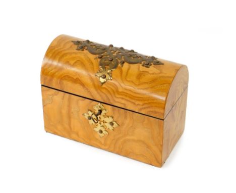 A Victorian pollard oak domed tea caddy, with gothic brass overlay and escutcheon, by Field of 67 Regent Street, London, twin