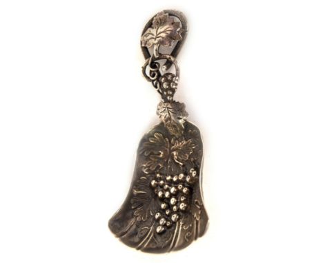 A Victorian silver caddy spoon, with a bell shaped bowl having embossed fruiting vine decoration and vine leaf handle, Birmin