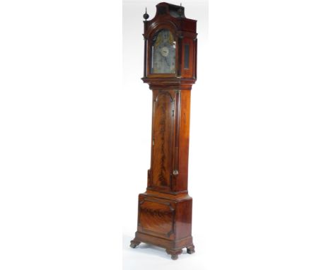 Richard Comber of Lewes. A George III mahogany longcase clock, with shaped and pillared hood, having ball and spike finials, 