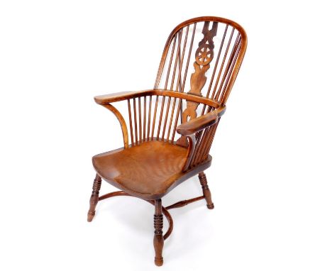 An early 19thC ash, elm and fruitwood high back Windsor chair, probably North Lincolnshire or East Riding of Yorkshire with w