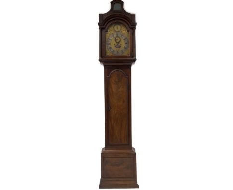 Francis Perigal of London. A George III flame mahogany longcase clock, with arched top and verre eglomise panel, to a brass r