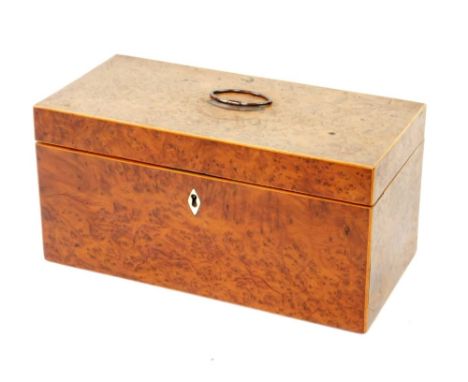 A George III burr yew tea caddy, of plain rectangular design, the hinged lid opening to reveal two original tea boxes and fit