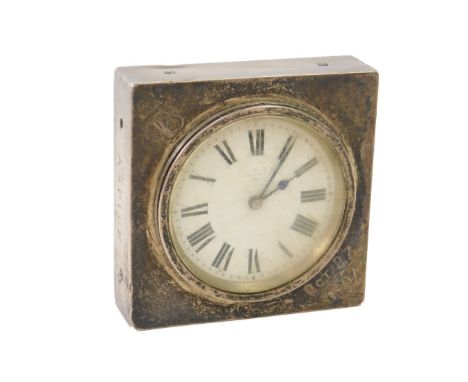 A Victorian silver cased desk calendar clock, enamel dial bearing Roman numerals, the case with calendar dial back, engraved 