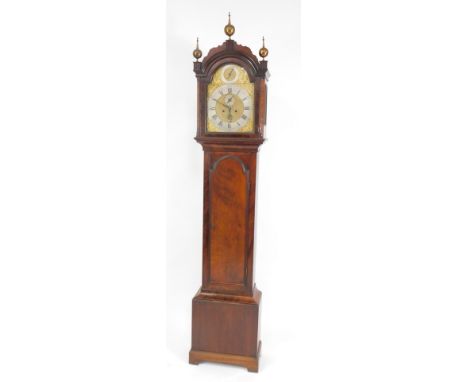 A London quality early 19thC mahogany longcase clock, with an arch canted hood having bell ornaments, flame mahogany case, fi