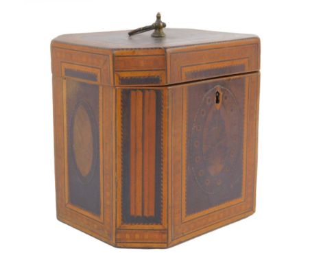 A George III satinwood and mahogany octagonal tea caddy, decorated with marquetry panels, cross banding and boxwood line inla