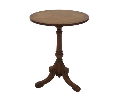 A Victorian walnut wine table, with burr walnut veneered top, baluster turned stem and square channeled sabre legs with scrol