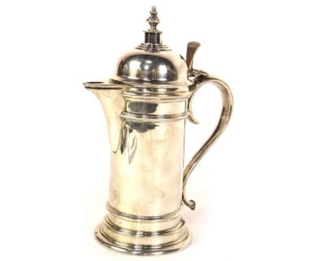 A George VI silver flagon, having domed hinged lid with finial knop and query handle to the cylindrical body, with ring colla