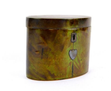 A George III green tortoiseshell oval tea caddy, the hinged lid opening to reveal a single compartment, the front with shield