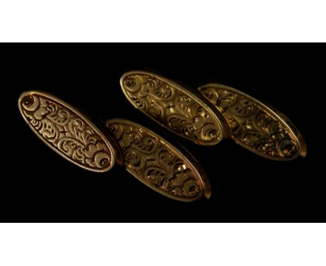A pair of 9ct gold chain link cufflinks, of oval design with floral engraving, 3.7g all in. 