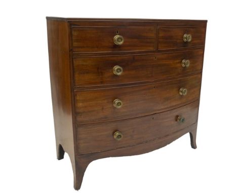 A George III mahogany bowfront chest, of two short and three long graduated cock beaded drawers with pressed brass knob handl