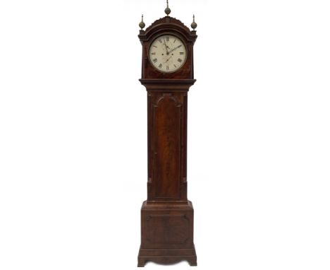 An early 19thC flamed mahogany London cased longcase clock, with fret carved arched hood with brass ball and spike finials, m