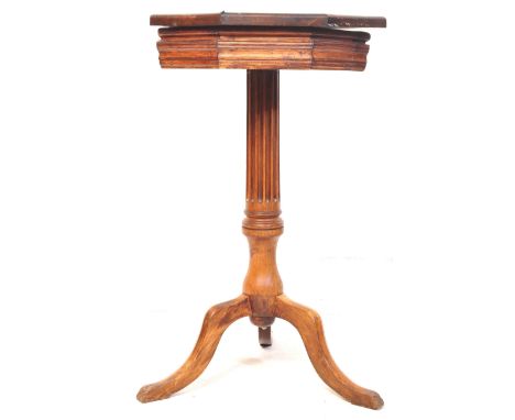 A 19th Century Victorian octagonal mahogany ladies pedestal work/occasional table. The table having a pull up hinged lid open