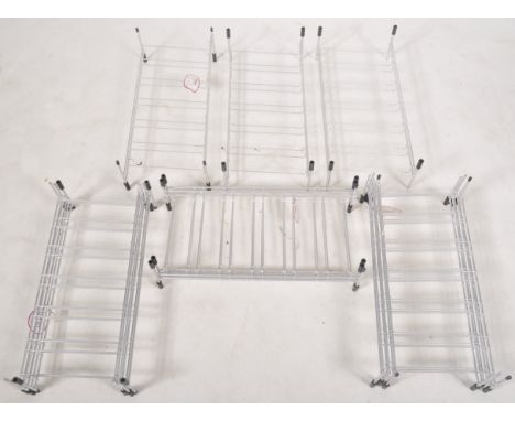 Hago - Model 353 - A collection of four retro vintage industrial atomic space age sputnik three tier wine racks of tubular fo