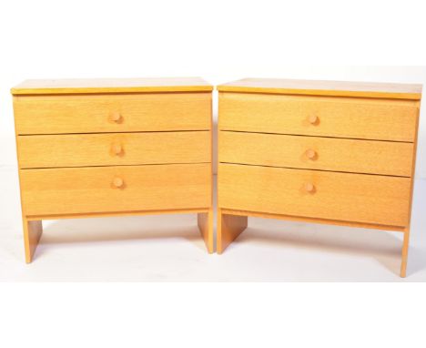 British Meredew furniture - A pair of retro vintage mid 20th Century circa 1960's light oak chest of drawers raised on uprigh