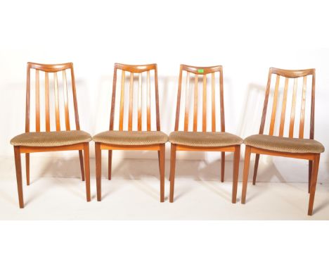 A group of four retro vintage mid 20th century circa 1960s teak G Plan dining chairs. The chairs having a teak structure with