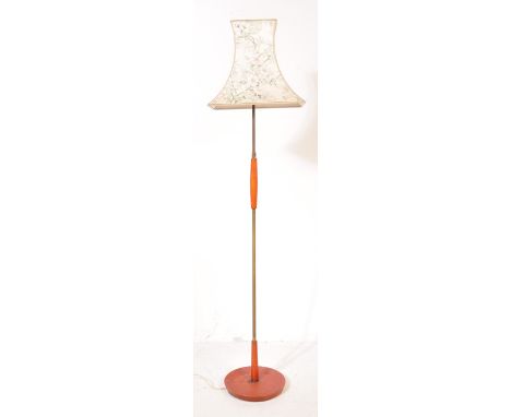 A vintage retro mid 20th century circa. 1970's teak wood standard floor standing lamp with floral bell shade.&nbsp;