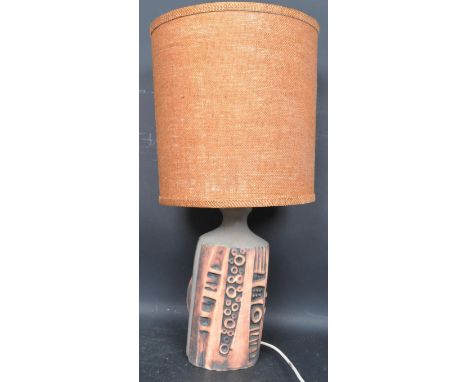 A retro vintage 20th century circa. 1960's Cornish Newlyn Tremaen Pottery lamp ion the West German style with circular orange
