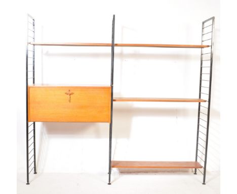 Robert Heal - Staples - Ladderax - An original retro vintage 20th Century two bay room divider leg wall unit having a fall fr