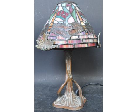 A 20th Century vintage retro Art Nouveau Tiffany style desk lamp / table lamp. The lamp having a multicolour panel glass shad