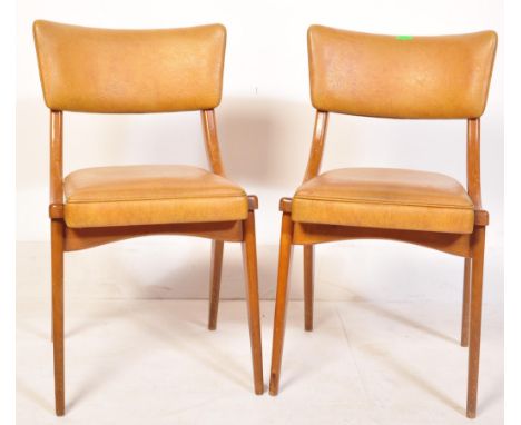 Ben Chairs ' Benchairs ' of Stowe - A set of two mid 20th Century retro vintage dining chairs having a curved back rest raise