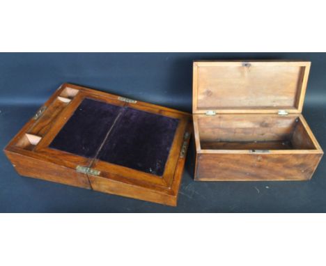 A 19th century Victorian burr walnut writing slope having an empty brass cartouche atop with velvet lined appointed interior,