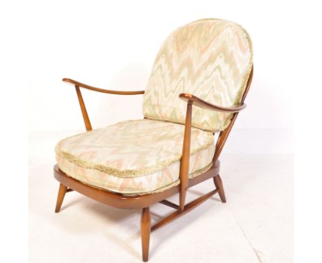 Lucian Ercolani - Ercol - Model 203 - A 1970's vintage retro beech and elm easy / lounge chair / armchair having large hoop s
