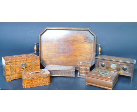 A collection of vintage oak trinket boxes. To include; A musical box, a woven basket with handle box, a hinged lidded rectang