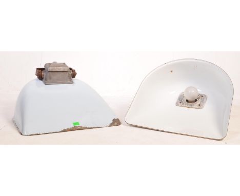 Two retro vintage factory industrial mid 20th century Simplex lights having large shaped light shades with hinged supports ab