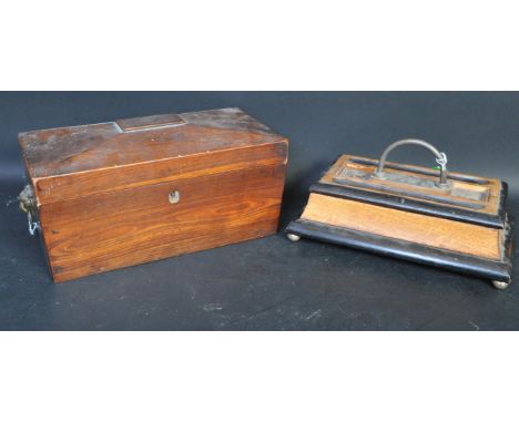 A 19th century mahogany tea caddy with appointed interior and cartouche atop, together with an open top desk tidy with pen tr